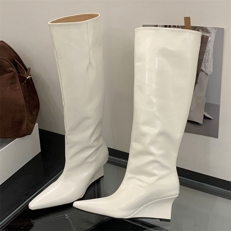 รองเท้าบูทหุ้มข้อผู้หญิงแบบส้น - Wedge Heeled Sneaker บทวิจารณ์และราคา